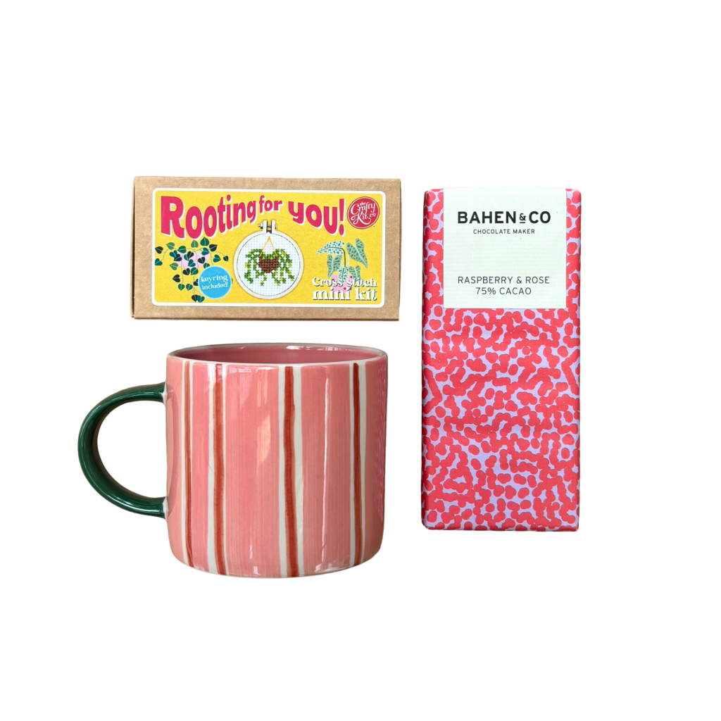 Pick-Me-Up Cup Gift Set With Chocolate Add On Crafty Co Mini Matchbox Cross Stitch Kit - Rooting For You! design Jones & Co Mug Bloomie Pink Stripe Bahen & Co Chocolate Bar Raspberry & Rose 75% Cacao