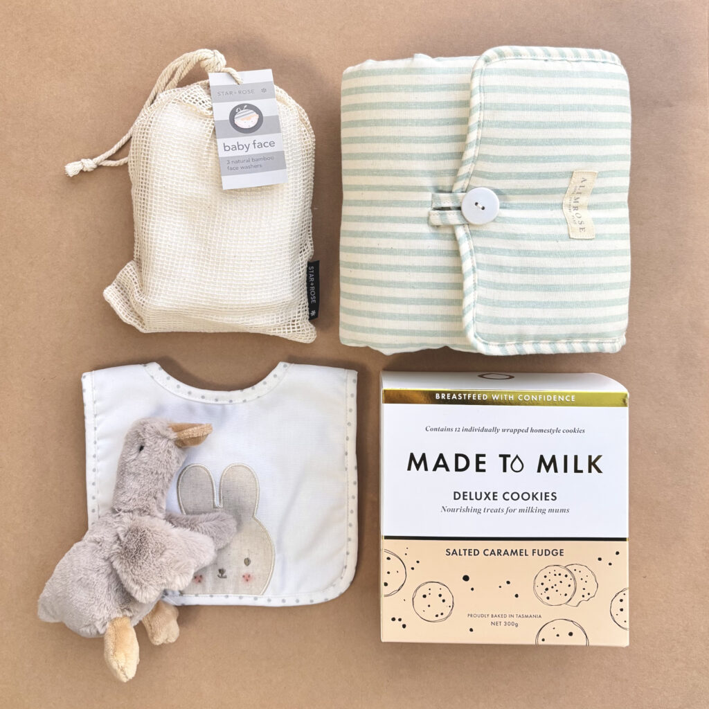Welcome Baby Deluxe Baby Hamper gender neutral baby gifts - Made to Milk Lactation Cookies salted caramel fudge - Baby Swaddle - Baby change mat portable mint - baby rattle