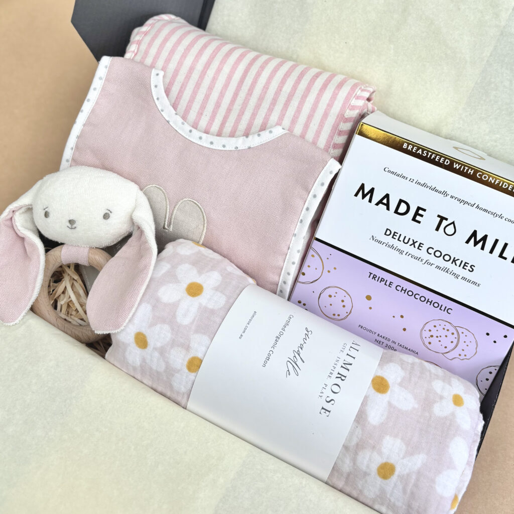 Welcome Baby girl Deluxe Baby Hamper Baby girl gifts - Made to Milk Lactation Cookies Triple Choc - Baby Swaddle pink - Baby change mat portable pink - baby teething toy pink